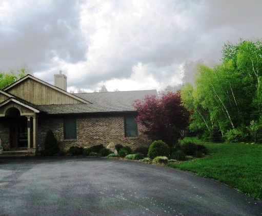 may08-house-stormclouds-corrected-and-resized.jpg