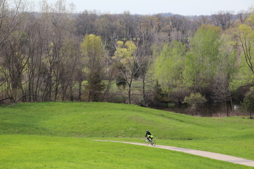 Moving through green hills.