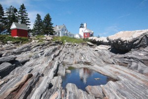 The light warns ships of the rocks.