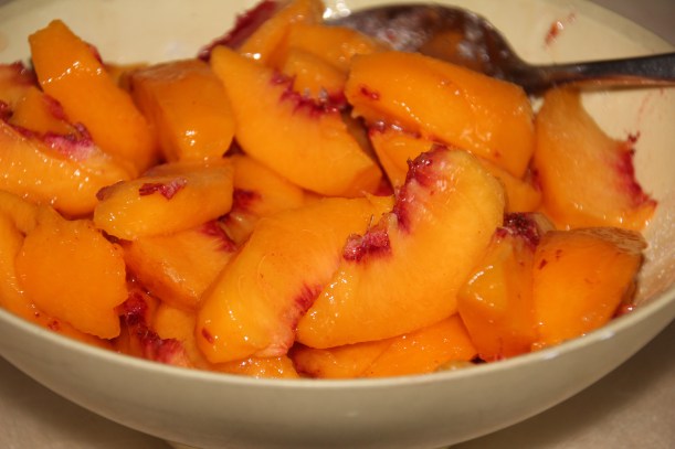 Peaches in my mom's old yellow bowl.