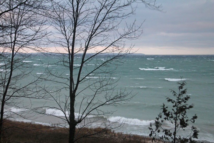 Under dark clouds the air has been swept clean.  See the island?