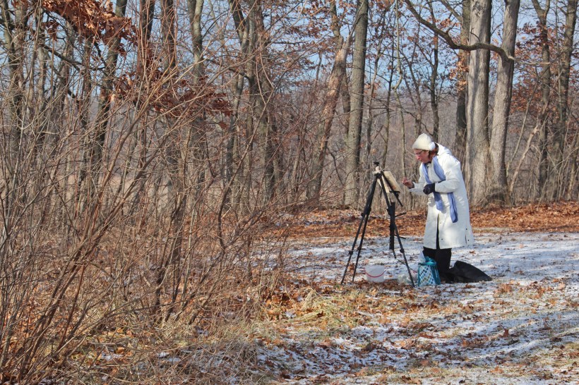 Painting in the woods.