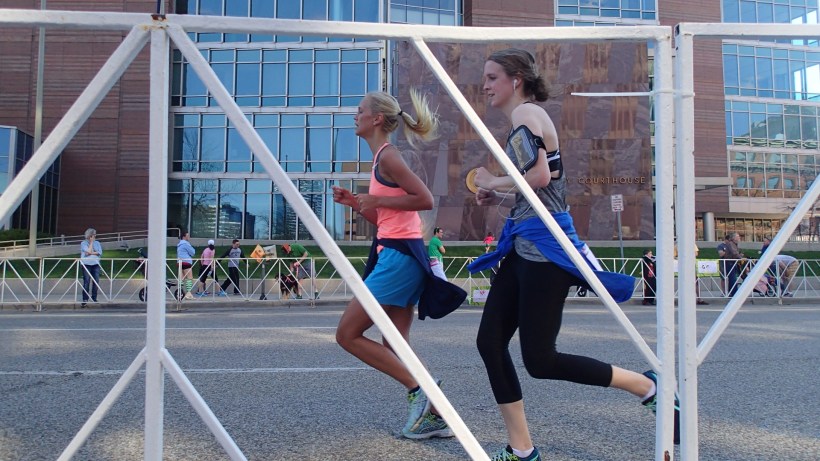 Suddenly I was tired.  I sat on the curb and shot through the fence.