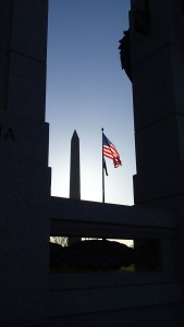 WW II, Washington Monument and Flag in morning light.
