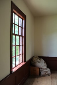 Bedroll stored in a corner