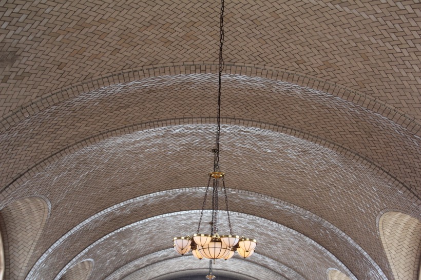 Notice the beautiful tiled arches.  And the original fixture.