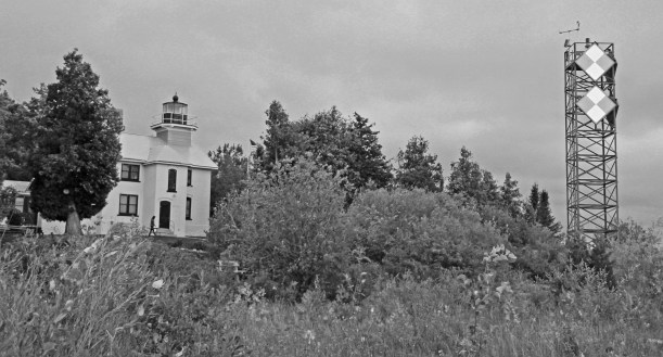 Old and new lighthouses share the point.