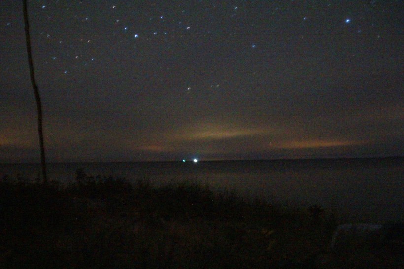Freighter slides through the night.